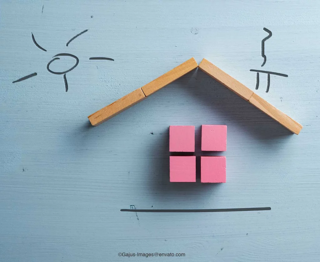 Tilo Kübler Meisterfachbetrieb Heizung Klima Sanitär Haus aus pinken holzblöcken mit handgemalten Schornstein und Sonne auf blauem Hintergrund